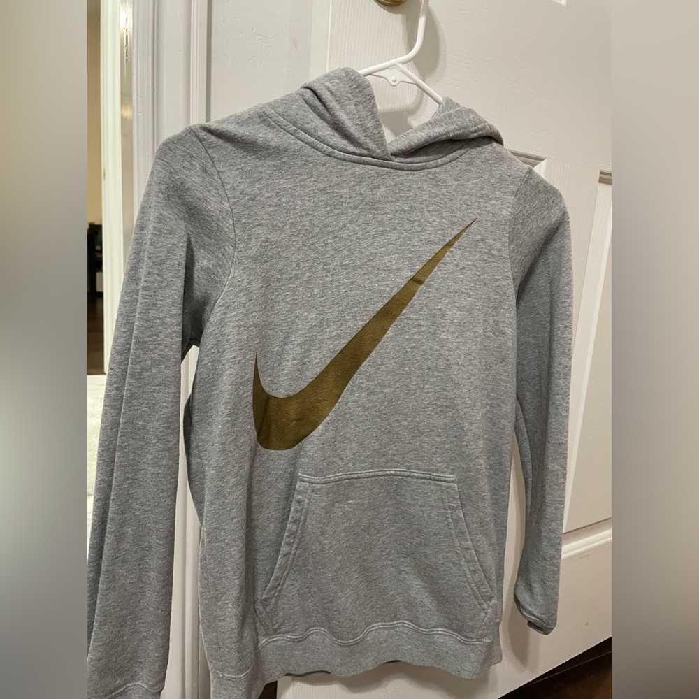 grey NIKE sweatshirt with gold